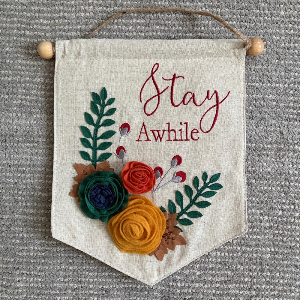 Floral Wall Hanging Banner with 'Stay Awhile' Embroidery
